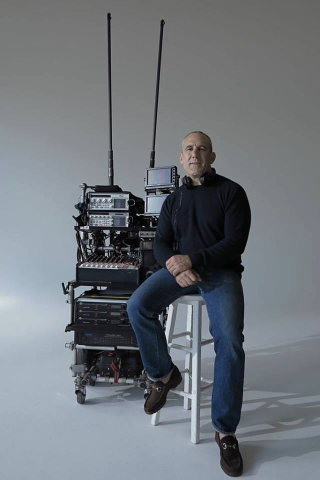 Production Sound Mixer Simon Hayes, alongside his sound cart. Check out those wireless antennas!